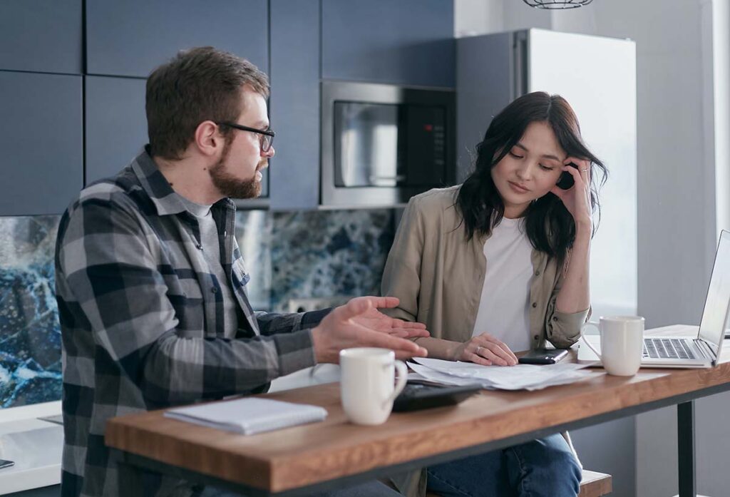 Couple Upset Working on Taxes