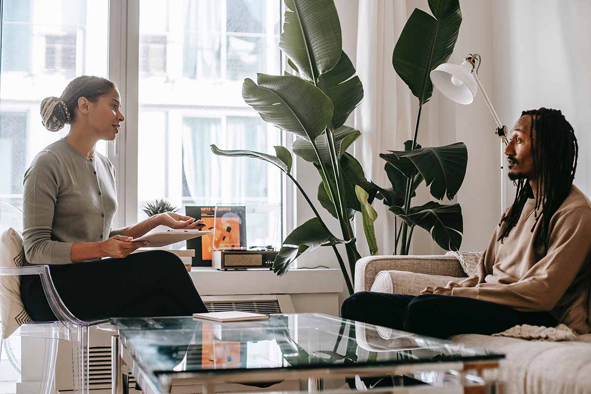 Couple Talking to Each Other About Deducting Expenses