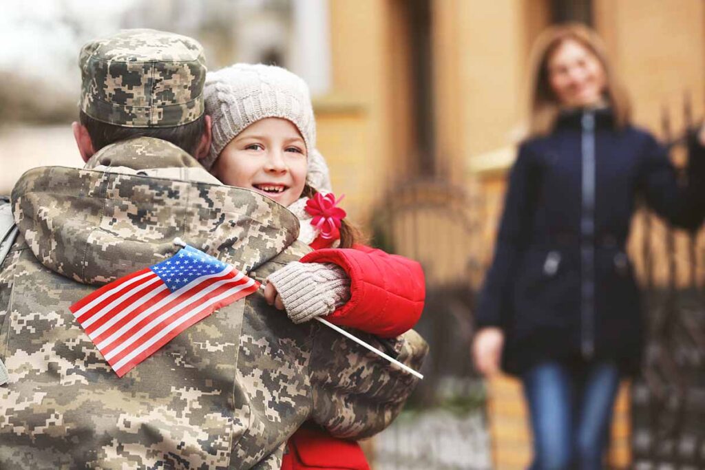 Soldier Hugging Daughter
